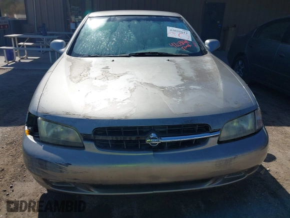 1999 Nissan Altima XE with VIN 1N4DL01D5XC124936, listed as a IAAI auction lot 42031611 with 140,519 mi miles. Bid and sale history available at carsss.com. Image 6.