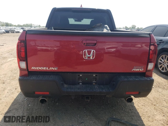 2021 Honda Ridgeline Sport with VIN 5FPYK3F10MB017541, listed as a Copart auction lot 60257215 with 12,227 mi miles and Salvage title. Bid and sale history available at DreamBid. Image 6.
