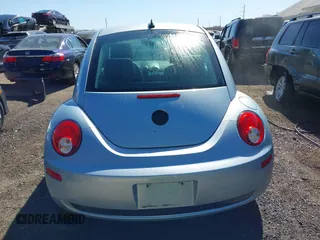 2010 Volkswagen New Beetle Coupe with VIN 3VWRW3AG2AM018644, listed as a IAAI auction lot 41815380 with 99,738 mi miles. Bid and sale history available at carsss.com. Image 16.