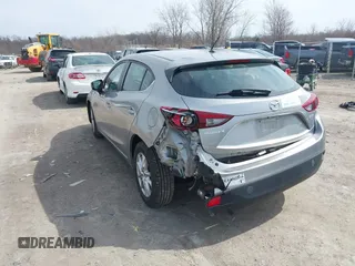 2015 Mazda 3 i Touring with VIN 3MZBM1L77FM138326, listed as a IAAI auction lot 41839685 with 97,506 mi miles and . Bid and sale history available at carsss.com. Image 3.