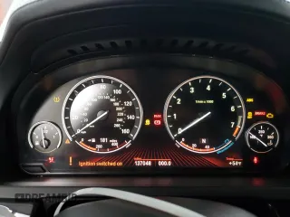 2011 BMW 7 Series 740i with VIN WBAKA4C55BC613072, listed as a Copart auction lot 87712105 with 137,048 mi miles and Clean Title. Bid and sale history available at carsss.com. Image 9.
