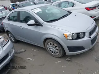 2013 Chevrolet Sonic LS with VIN 1G1JA5SH7D4221376, listed as a IAAI auction lot 41154565 with 147,021 mi miles and . Bid and sale history available at DreamBid. Image 1.
