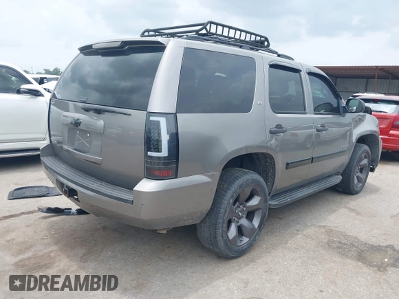 2007 Chevrolet Tahoe LS with VIN 1GNFC13C57R279441, listed as a IAAI auction lot 42428981 with 229,827 mi miles and . Bid and sale history available at DreamBid. Image 4.