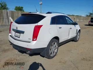 2013 Cadillac SRX Performance Collection with VIN 3GYFNHE31DS597987, listed as a IAAI auction lot 42319058 with 139,670 mi miles and . Bid and sale history available at DreamBid. Image 4.