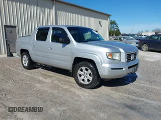2006 Honda Ridgeline RTL z VIN 2HJYK16506H561465, wystawiony jako IAAI lot #41643676 z przebiegiem 286 975 mil mil oraz . Historia ofert i sprzedaży dostępna na DreamBid. Obrazek 1.