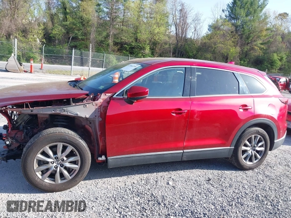 2019 Mazda CX-9 Touring with VIN JM3TCACY0K0310851, listed as a IAAI auction lot 42066395 with 91,046 mi miles and . Bid and sale history available at DreamBid. Image 15.