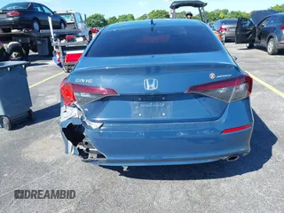 2025 Honda Civic Sport z VIN 2HGFE2F59SH530459, wystawiony jako IAAI lot #41698287 z przebiegiem 19 987 mil mil oraz . Historia ofert i sprzedaży dostępna na DreamBid. Obrazek 17.