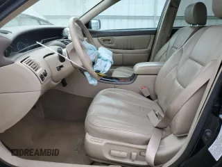 2000 Toyota Avalon XL with VIN 4T1BF28B4YU105732, listed as a Copart auction lot 54752665 with 143,855 mi miles and Salvage Title. Bid and sale history available at DreamBid. Image 7.
