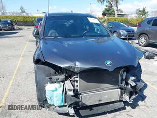 2018 BMW X1 sDrive28i with VIN WBXHU7C36J5L05628, listed as a IAAI auction lot 41708522 with 91,352 mi miles and . Bid and sale history available at DreamBid. Image 13.