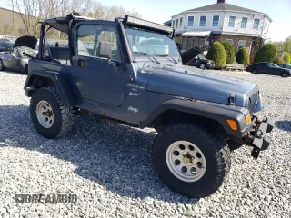 2002 Jeep Wrangler Sport with VIN 1J4FA49S92P715480, listed as a Copart auction lot 55157545 with 153,560 mi miles and Clean Title. Bid and sale history available at carsss.com. Image 4.