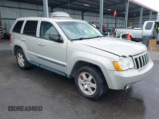 2008 Jeep Grand Cherokee Laredo with VIN 1J8GS48K58C105108, listed as a IAAI auction lot 42068055 with 201,272 mi miles. Bid and sale history available at carsss.com. Image 1.