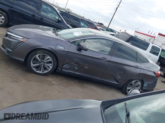 2019 Honda Clarity Plug-In Hybrid with VIN JHMZC5F18KC006818, listed as a IAAI auction lot 41905854 with 85,135 mi miles. Bid and sale history available at carsss.com. Image 14.