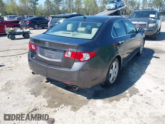 2010 Acura TSX with VIN JH4CU2F63AC003630, listed as a IAAI auction lot 42002216 with 131,244 mi miles. Bid and sale history available at carsss.com. Image 4.