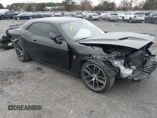 2016 Dodge Challenger 392 Hemi Scat Pack Shaker z VIN 2C3CDZFJ0GH236812, wystawiony jako IAAI lot #40931899 z przebiegiem 66 678 mil mil oraz . Historia ofert i sprzedaży dostępna na DreamBid. Obrazek 1.