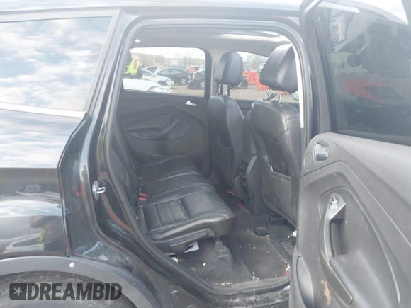 2015 Ford Escape Titanium with VIN 1FMCU9J96FUC11476, listed as a IAAI auction lot 41967914 with 149,341 mi miles. Bid and sale history available at carsss.com. Image 8.