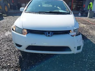 2008 Honda Civic Cpe EX-L with VIN 2HGFG12908H562786, listed as a IAAI auction lot 41479885 with 158,928 mi miles. Bid and sale history available at carsss.com. Image 6.