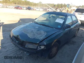 1999 Mitsubishi Mirage DE z VIN JA3AY26A0XU017889, wystawiony jako IAAI lot #40457172 z przebiegiem Nie podano mil oraz . Historia ofert i sprzedaży dostępna na DreamBid. Obrazek 2.
