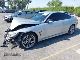 2014 BMW 4 Series 428i xDrive with VIN WBA3N9C54EF721188, listed as a IAAI auction lot 42143305 with Not provided miles and . Bid and sale history available at DreamBid. Image 17.
