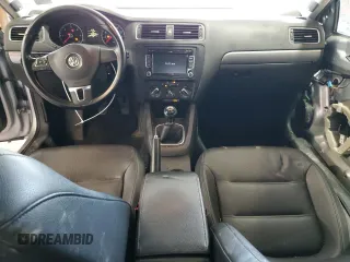 2014 Volkswagen Jetta TDI w/Premium with VIN 3VW3L7AJ3EM310892, listed as a Copart auction lot 61235765 with 242,970 mi miles and Salvage title. Bid and sale history available at DreamBid. Image 8.