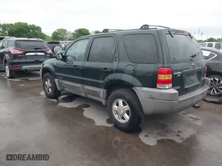 2001 Ford Escape XLT with VIN 1FMCU03101KC25039, listed as a IAAI auction lot 41900122 with 218,126 mi miles. Bid and sale history available at carsss.com. Image 3.