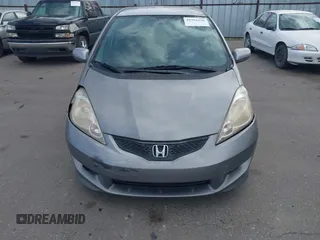2009 Honda Fit Sport with VIN JHMGE884X9S045470, listed as a IAAI auction lot 41993638 with 181,198 mi miles. Bid and sale history available at carsss.com. Image 6.