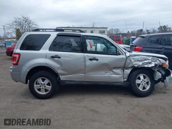 2012 Ford Escape XLT z VIN 1FMCU9DG4CKC57695, wystawiony jako IAAI lot #41716974 z przebiegiem 143 860 mil mil oraz . Historia ofert i sprzedaży dostępna na DreamBid. Obrazek 12.