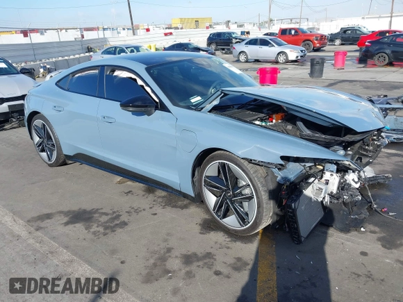 2023 Audi RS e-tron GT z VIN WAUBHBFWXP7903277, wystawiony jako IAAI lot #41098544 z przebiegiem 5781 mil mil oraz . Historia ofert i sprzedaży dostępna na DreamBid. Obrazek 1.