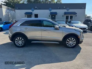 2023 Cadillac XT4 AWD Premium Luxury z VIN 1GYFZDR40PF108407, wystawiony jako Copart lot #86400754 z przebiegiem 8 724 mil mil oraz Nie do naprawy • Non repairable. Historia ofert i sprzedaży dostępna na DreamBid. Obrazek 13.