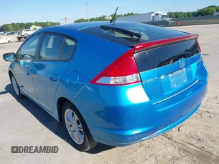 2010 Honda Insight EX with VIN JHMZE2H74AS013148, listed as a IAAI auction lot 42194894 with 114,885 mi miles and . Bid and sale history available at DreamBid. Image 3.
