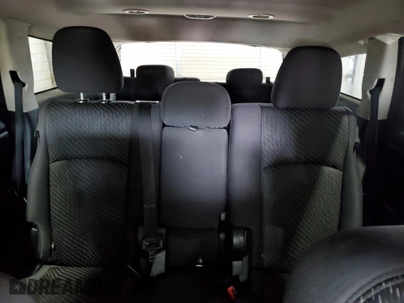 2013 Dodge Journey American Value with VIN 3C4PDCAB4DT581984, listed as a Copart auction lot 59953515 with 166,927 mi miles and Salvage title. Bid and sale history available at DreamBid. Image 10.