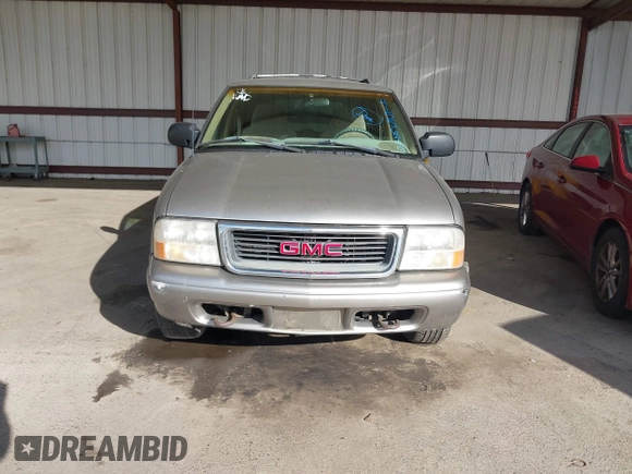 1999 GMC Jimmy SLE with VIN 1GKDT13W7X2529298, listed as a IAAI auction lot 41556249 with 114,750 mi miles. Bid and sale history available at carsss.com. Image 6.
