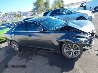 2018 Cadillac CTS Luxury RWD with VIN 1G6AR5SX3J0185585, listed as a IAAI auction lot 41673223 with 42,507 mi miles and . Bid and sale history available at DreamBid. Image 14.