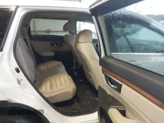 2019 Honda CR-V EX with VIN 2HKRW2H56KH641449, listed as a IAAI auction lot 41762860 with 181,557 mi miles and . Bid and sale history available at DreamBid. Image 8.