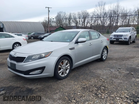 2013 Kia Optima LX with VIN 5XXGM4A74DG129353, listed as a IAAI auction lot 42035909 with 140,315 mi miles. Bid and sale history available at carsss.com. Image 2.