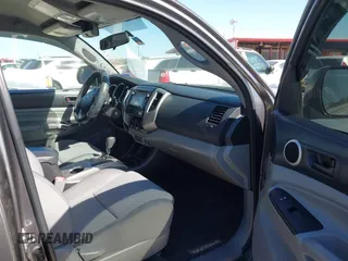 2014 Toyota Tacoma PreRunner with VIN 5TFJU4GN3EX057731, listed as a IAAI auction lot 41703750 with 110,321 mi miles. Bid and sale history available at carsss.com. Image 5.