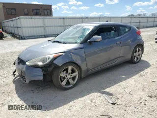 2014 Hyundai Veloster z VIN KMHTC6AD3EU215750, wystawiony jako Copart lot #52769165 z przebiegiem 114 364 mil mil oraz Szkoda całkowita • Salvage title. Historia ofert i sprzedaży dostępna na DreamBid. Obrazek 1.