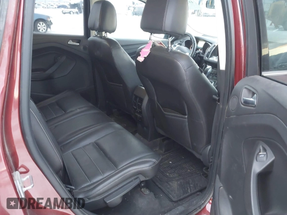 2014 Ford Escape Titanium with VIN 1FMCU9J94EUA13509, listed as a IAAI auction lot 41291232 with 174,303 mi miles. Bid and sale history available at carsss.com. Image 8.