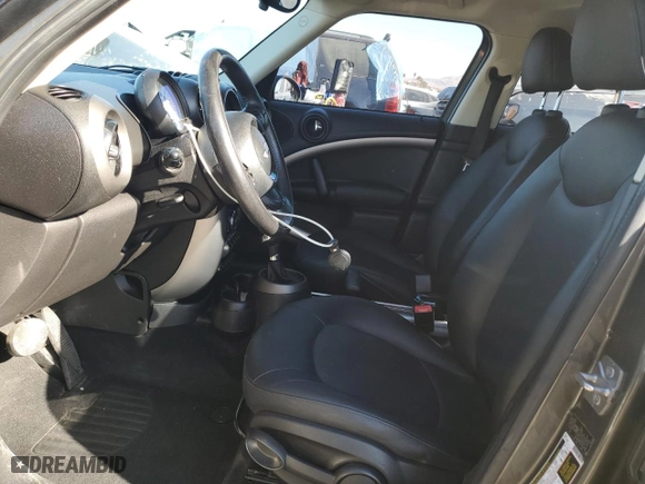 2012 MINI Cooper Countryman with VIN WMWZB3C5XCWM04268, listed as a Copart auction lot 43363015 with 94,346 mi miles and Salvage Title. Bid and sale history available at carsss.com. Image 7.