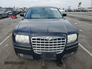 2007 Chrysler 300 Signature with VIN 2C3KA53G57H877394, listed as a Copart auction lot 71302834 with 134,697 mi miles and Salvage Title. Bid and sale history available at carsss.com. Image 5.
