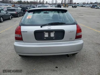1999 Honda Civic DX with VIN 2HGEJ6446XH100761, listed as a Copart auction lot 84277854 with 82,619 mi miles and Clean Title. Bid and sale history available at carsss.com. Image 6.