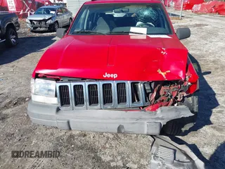 1996 Jeep Grand Cherokee Laredo with VIN 1J4EX58S8TC122302, listed as a IAAI auction lot 41218573 with 195,392 mi miles. Bid and sale history available at carsss.com. Image 12.