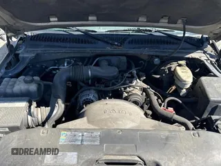 2003 GMC Sierra 1500 with VIN 2GTEC19X731239346, listed as a Copart auction lot 77679104 with 163,029 mi miles and Clean Title. Bid and sale history available at DreamBid. Image 7.