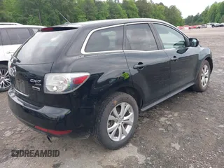 2011 Mazda CX-7 S Touring z VIN JM3ER4CL2B0362415, wystawiony jako IAAI lot #42214144 z przebiegiem 156 976 mil mil oraz . Historia ofert i sprzedaży dostępna na DreamBid. Obrazek 4.