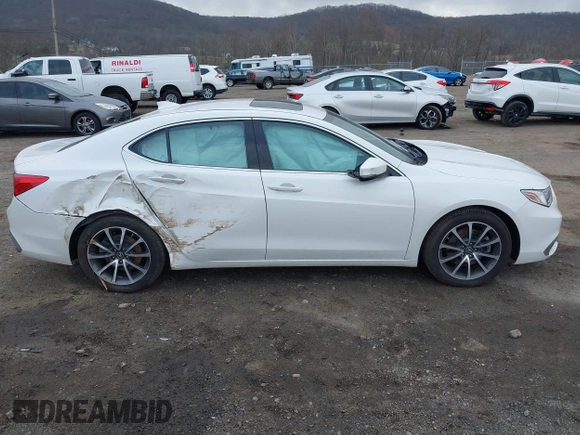 2019 Acura TLX z VIN 19UUB3F33KA007148, wystawiony jako IAAI lot #41889013 z przebiegiem 97 654 mil mil oraz . Historia ofert i sprzedaży dostępna na DreamBid. Obrazek 13.