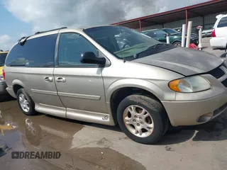 2004 Dodge Caravan SXT z VIN 2D4GP44L04R587370, wystawiony jako IAAI lot #42395592 z przebiegiem 69 853 mil mil oraz . Historia ofert i sprzedaży dostępna na DreamBid. Obrazek 1.
