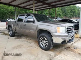 2012 GMC Sierra 1500 SLT with VIN 3GTP2WE74CG310914, listed as a Copart auction lot 56049905 with 106,882 mi miles and Salvage title. Bid and sale history available at DreamBid. Image 4.