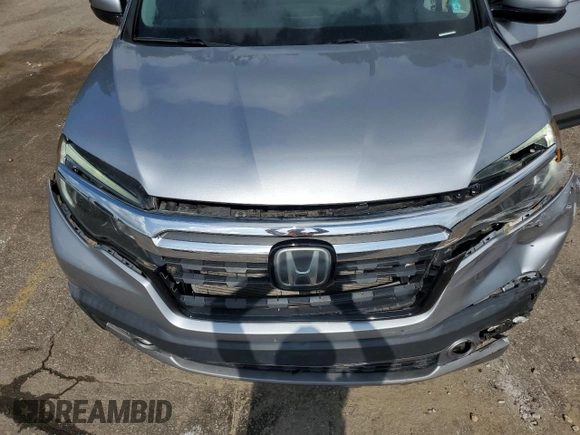 2019 Honda Ridgeline RTL-E z VIN 5FPYK3F72KB001049, wystawiony jako Copart lot #57706765 z przebiegiem 97 722 mil mil oraz Szkoda całkowita • Salvage title. Historia ofert i sprzedaży dostępna na DreamBid. Obrazek 11.