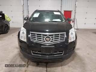 2015 Cadillac SRX with VIN 3GYFNAE36FS519604, listed as a IAAI auction lot 41215296 with 70,954 mi miles and . Bid and sale history available at DreamBid. Image 12.