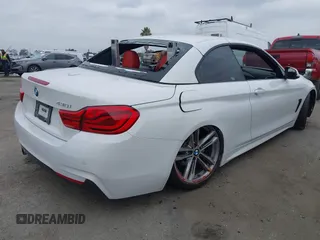 2018 BMW 4 Series 430i with VIN WBA4Z1C53JEC72907, listed as a IAAI auction lot 41436608 with 43,121 mi miles and . Bid and sale history available at carsss.com. Image 4.