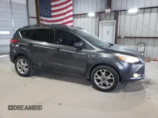 2016 Ford Escape SE with VIN 1FMCU0GX4GUC35861, listed as a Copart auction lot 51901375 with 140,193 mi miles and Salvage Title. Bid and sale history available at carsss.com. Image 4.
